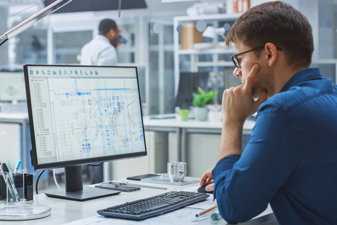 Civil engineer working on a computer